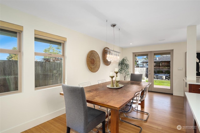 dining area with light wood-type flooring