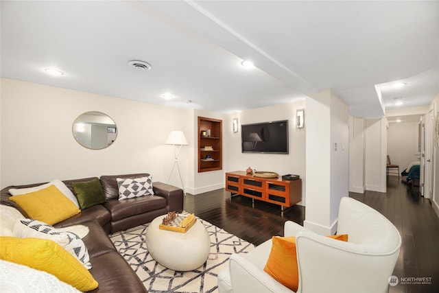 living room featuring dark hardwood / wood-style floors