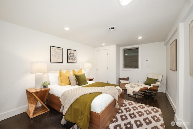 bedroom featuring dark wood-type flooring