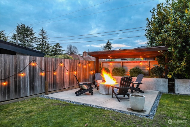 view of patio / terrace featuring a fire pit