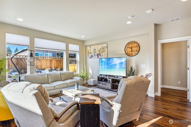 living room with dark hardwood / wood-style floors