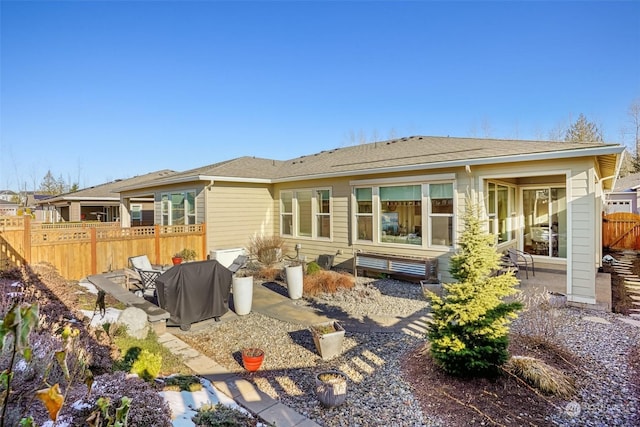 rear view of property with a patio