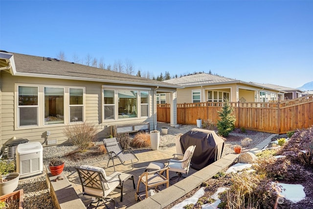 back of property with a patio area