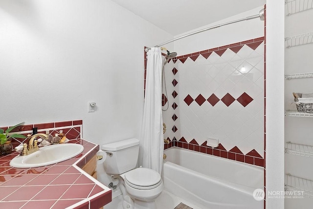 full bathroom featuring vanity, shower / bathtub combination with curtain, and toilet