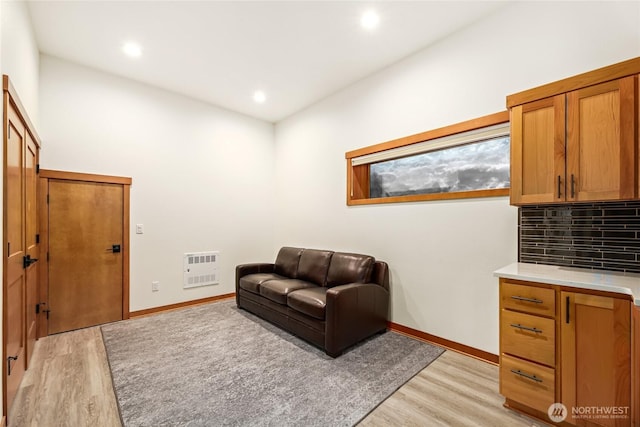 sitting room featuring light hardwood / wood-style floors