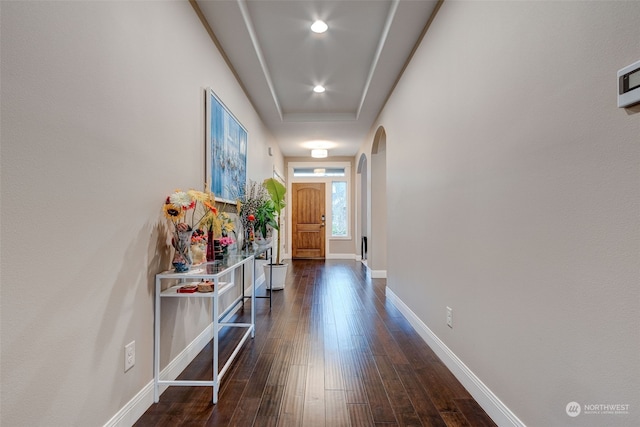 corridor featuring dark hardwood / wood-style flooring