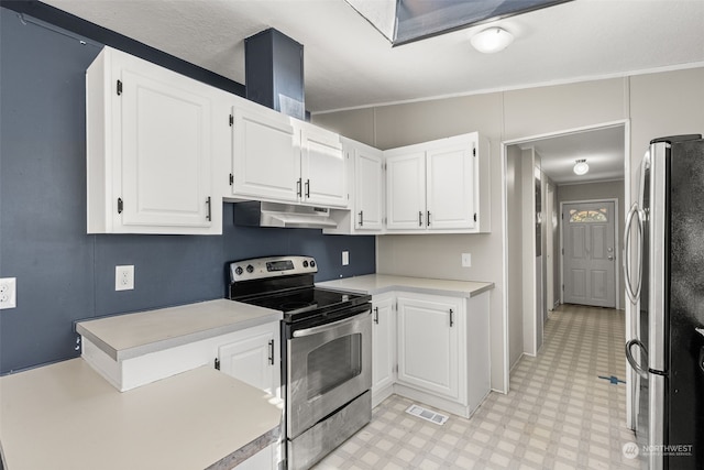 kitchen featuring white cabinetry, appliances with stainless steel finishes, and ornamental molding