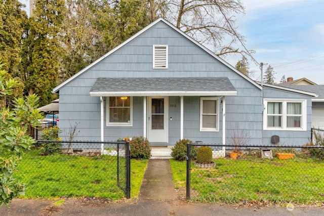 bungalow with a front yard