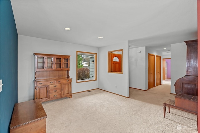 912 Bell Dr, Cosmopolis, WA 98537 - living area featuring baseboards, light colored carpet, and recessed lighting