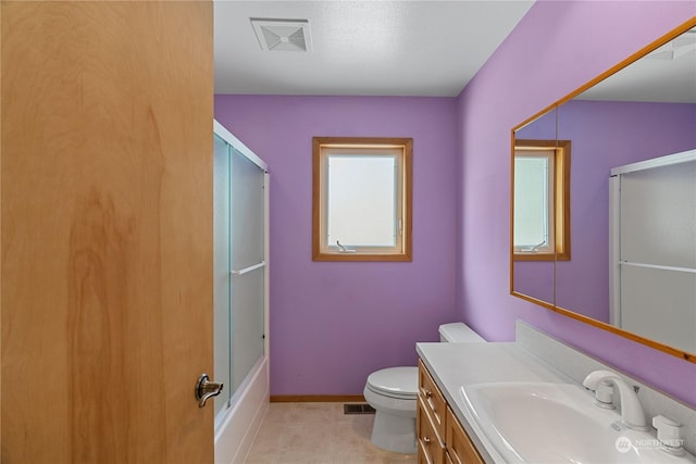 912 Bell Dr, Cosmopolis, WA 98537 - bathroom featuring baseboards, visible vents, vanity, and toilet