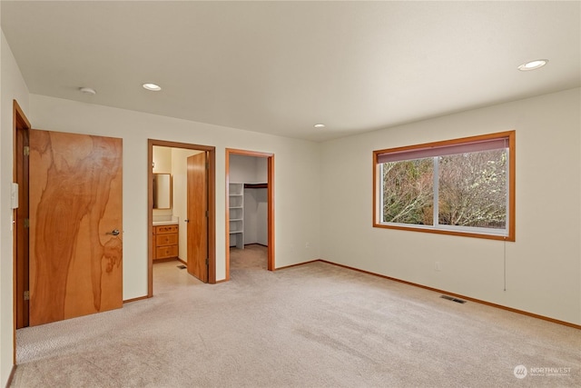 912 Bell Dr, Cosmopolis, WA 98537 - unfurnished bedroom featuring recessed lighting, visible vents, baseboards, a spacious closet, and carpet