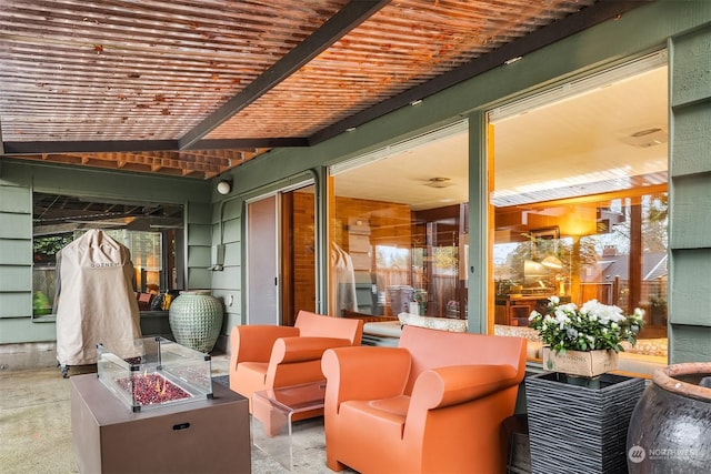 view of patio with an outdoor fire pit