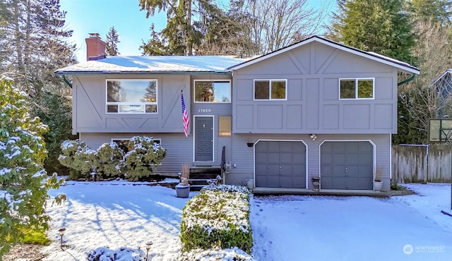 bi-level home featuring a garage