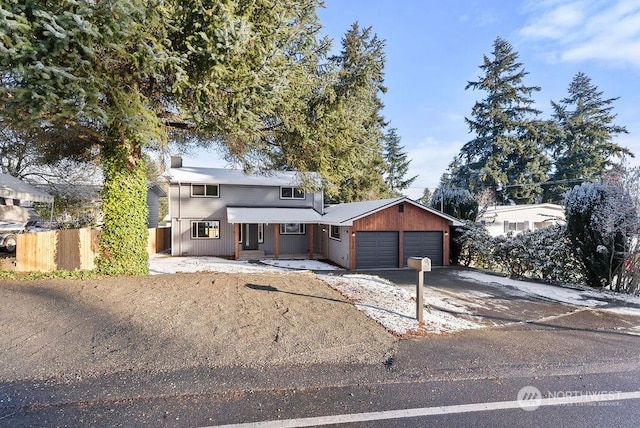 view of front of property featuring a garage