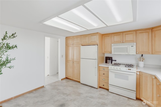 kitchen featuring white appliances and light brown cabinets