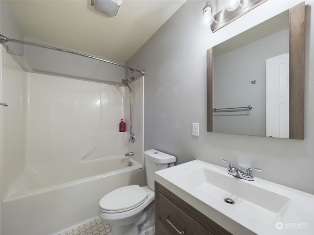 full bathroom featuring vanity, shower / washtub combination, and toilet