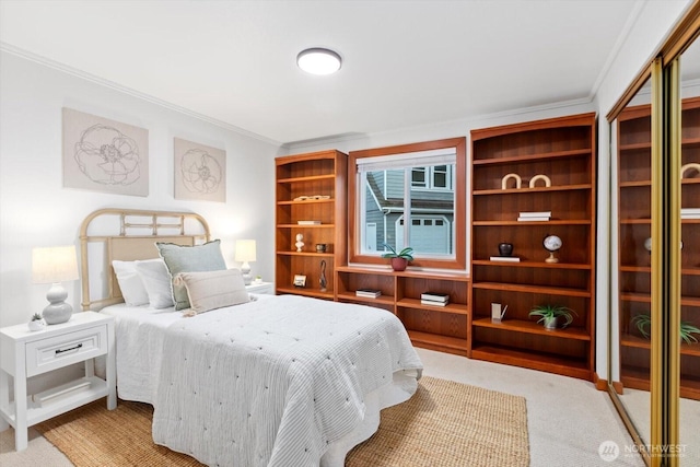 bedroom featuring light colored carpet and crown molding