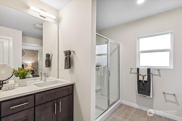 bathroom with vanity and walk in shower