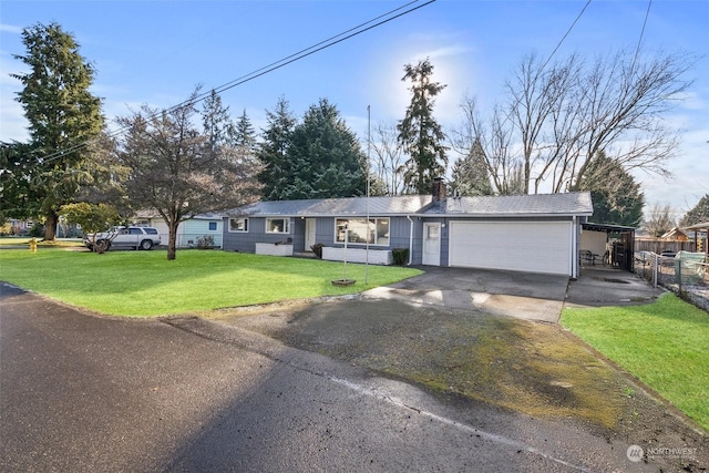 single story home with a garage and a front lawn