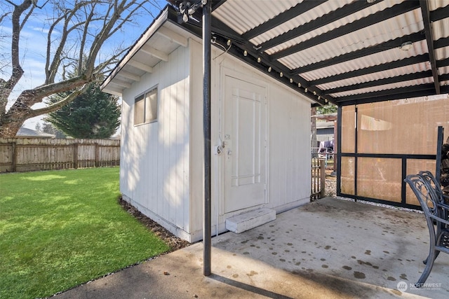 view of outdoor structure with a lawn