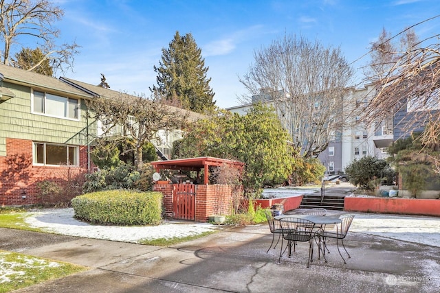 view of home's community with a patio