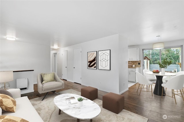 living room with light hardwood / wood-style flooring