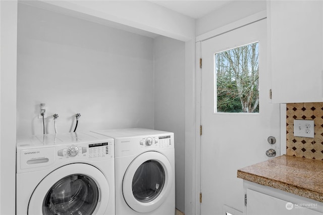 washroom with separate washer and dryer