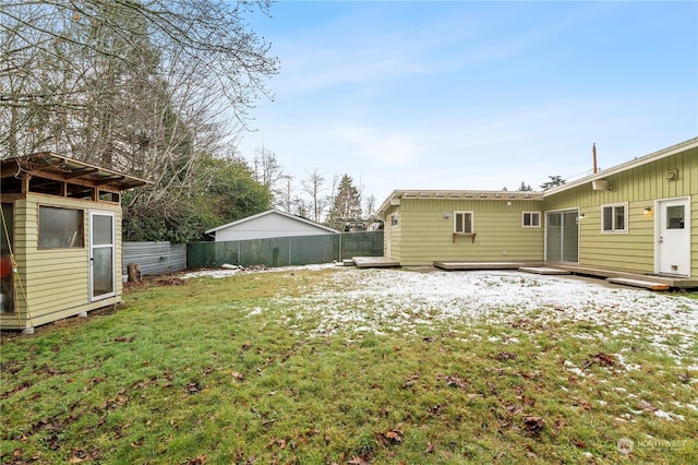 view of yard with a wooden deck