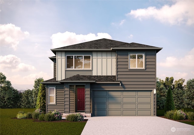 view of front of home featuring a garage and a front lawn