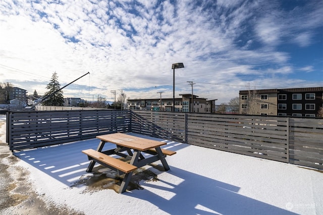 view of snow covered patio