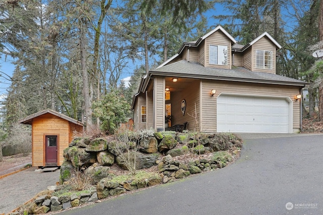 view of front of home with a garage