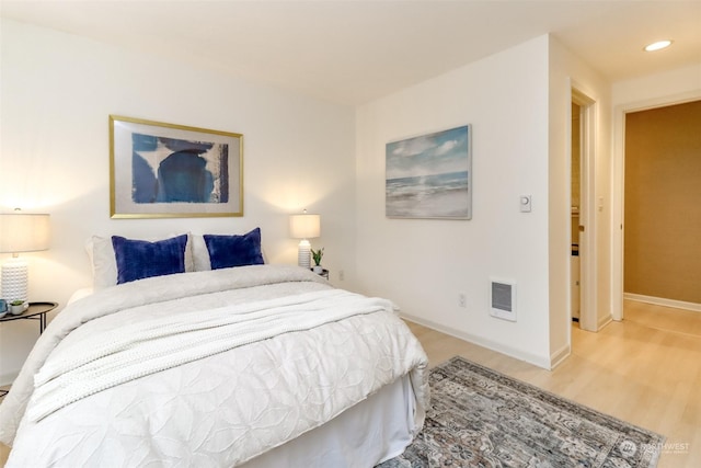 bedroom with light wood-type flooring