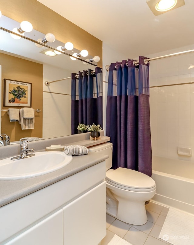 full bathroom featuring tile patterned flooring, shower / tub combo, vanity, and toilet