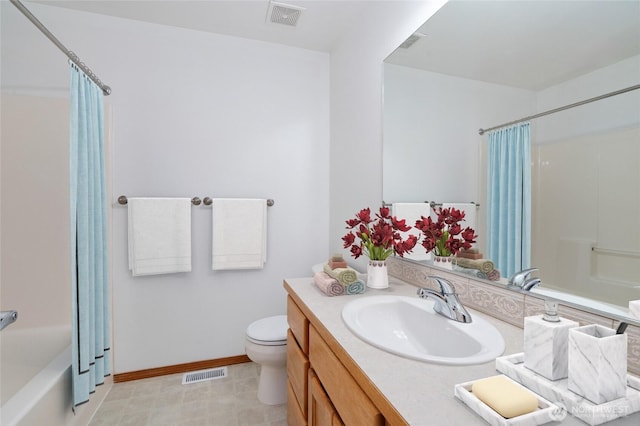 full bath with visible vents, vanity, and toilet