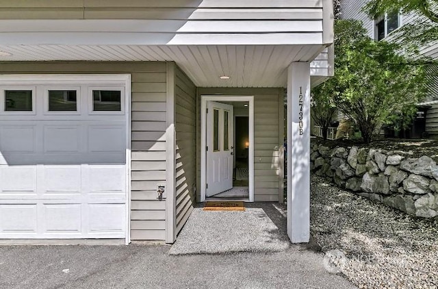 property entrance featuring a garage