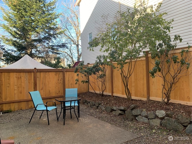 view of patio with fence