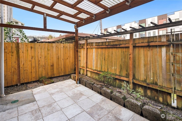 view of patio / terrace featuring a pergola