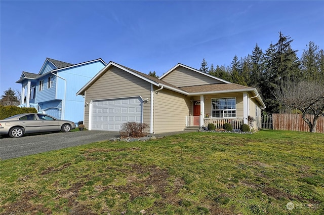 view of front facade featuring a garage and a front lawn