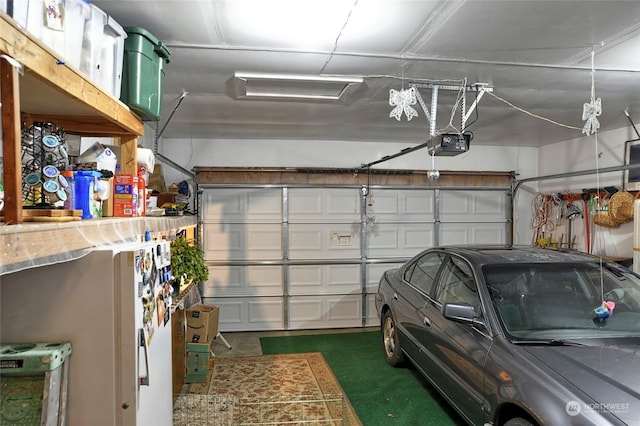 garage featuring a garage door opener