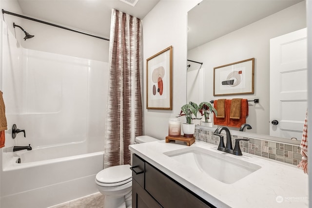 full bathroom with shower / bath combo, toilet, backsplash, and vanity