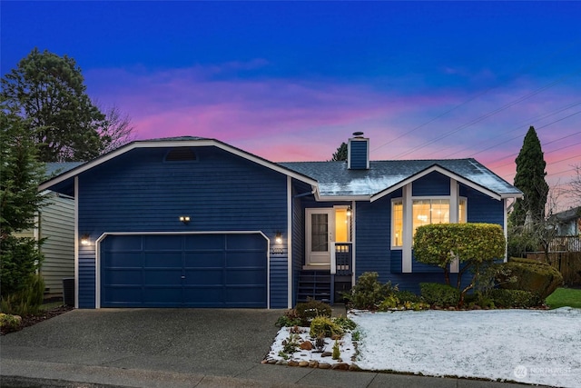 view of front of house with a garage