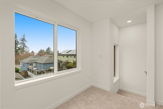 9221D 14th Ave NW, Seattle, WA 98117 - carpeted empty room featuring baseboards and recessed lighting