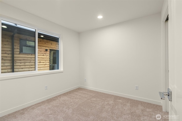 9221D 14th Ave NW, Seattle, WA 98117 - unfurnished room with carpet flooring and recessed lighting