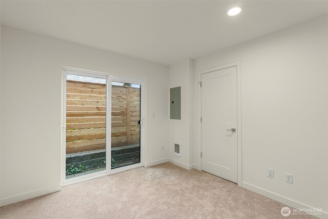 9221D 14th Ave NW, Seattle, WA 98117 - unfurnished room featuring electric panel, carpet, and recessed lighting