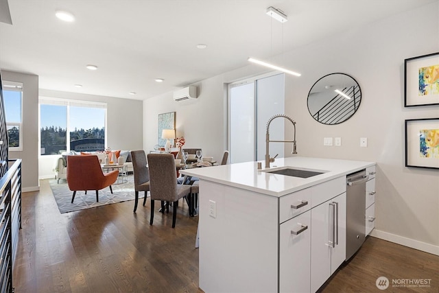 kitchen with sink, dishwasher, white cabinets, dark hardwood / wood-style flooring, and kitchen peninsula