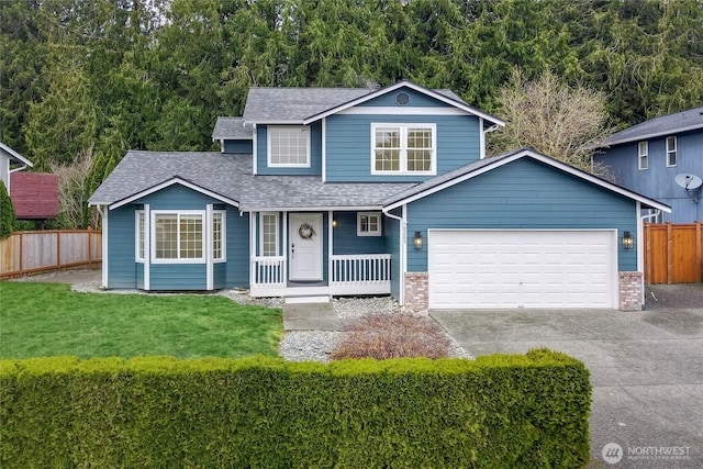 front facade with a front yard, a garage, and a porch