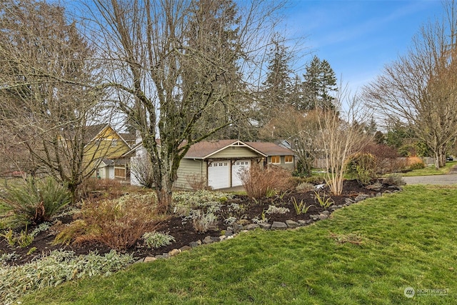 view of yard with a garage