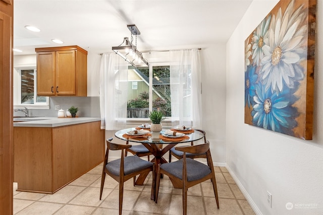 dining area featuring sink