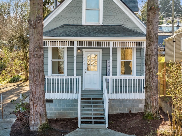 bungalow-style home with covered porch