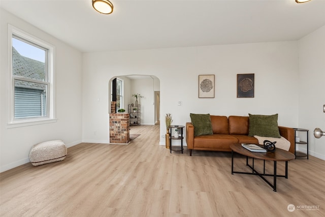 living room with light hardwood / wood-style flooring